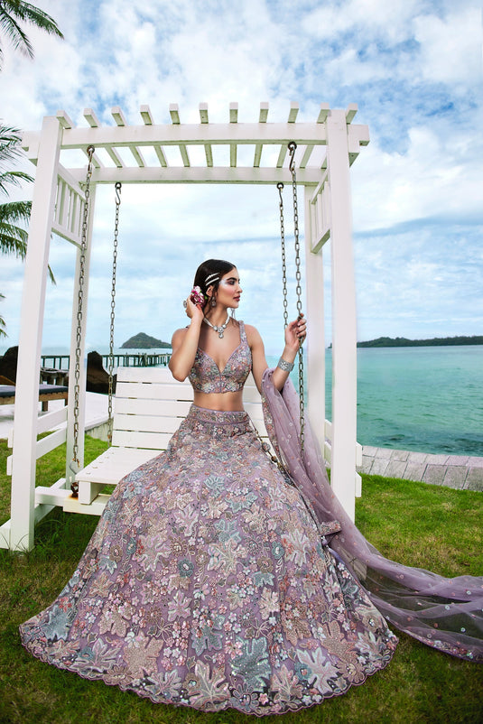 Lavender Color Multi Color Sequined Net Embroidered Semi Stitched Lehenga